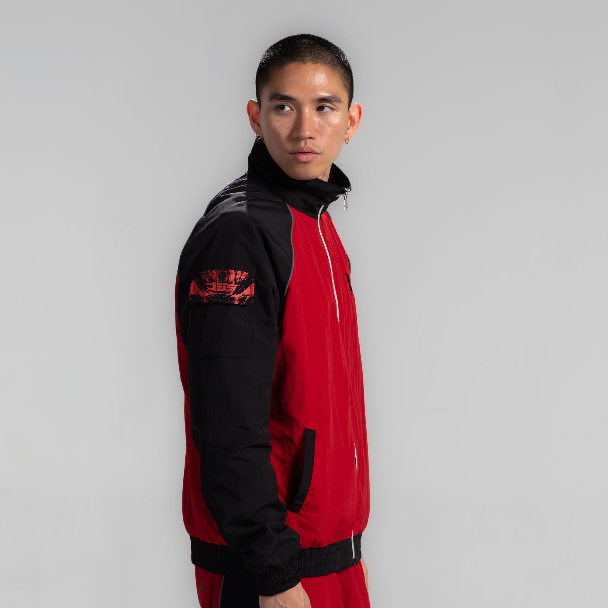 godzilla-essential-track-jacket-trainingsjacke-rot-schwarz-nylon image 8